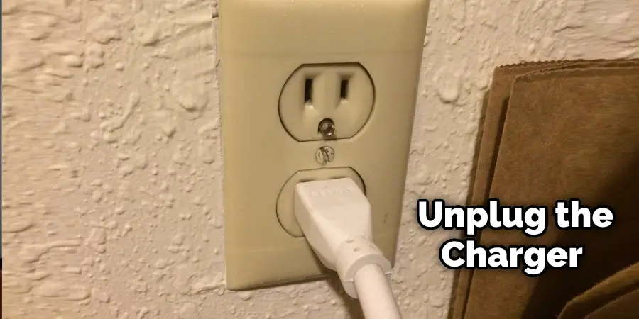 Unplug the Charger From the Wall Outlet