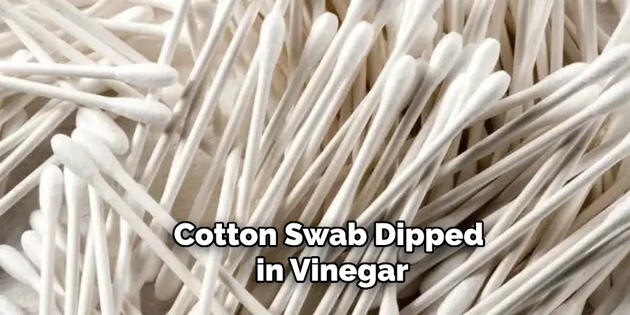 Cotton Swab Dipped in Vinegar