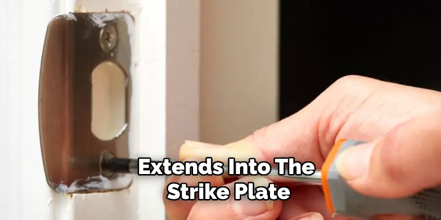 Extends Into the Strike Plate