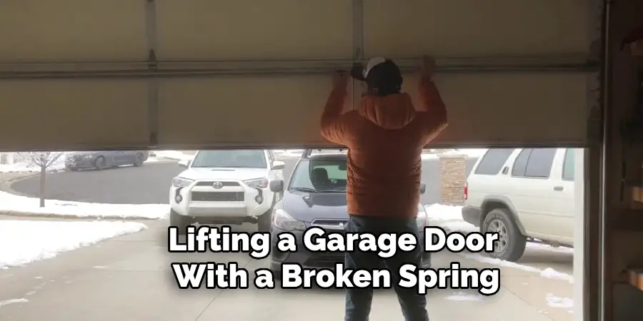 Lifting a Garage Door With a Broken Spring