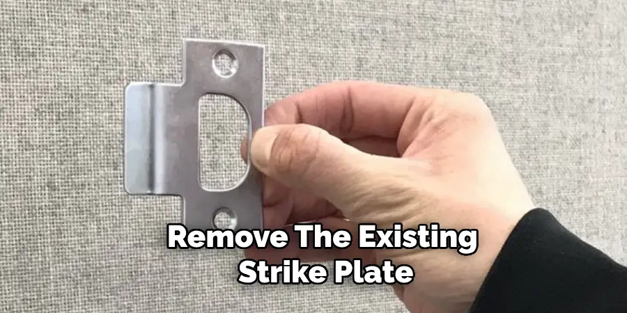 Remove the Existing Strike Plate