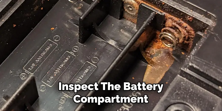 Inspect the Battery Compartment