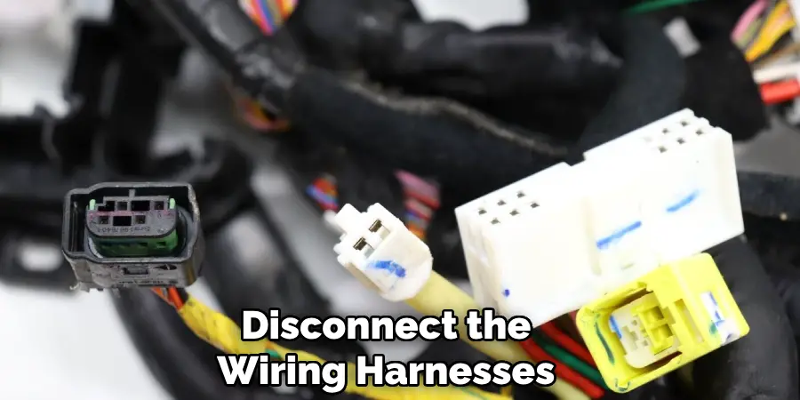 Disconnect the
Wiring Harnesses