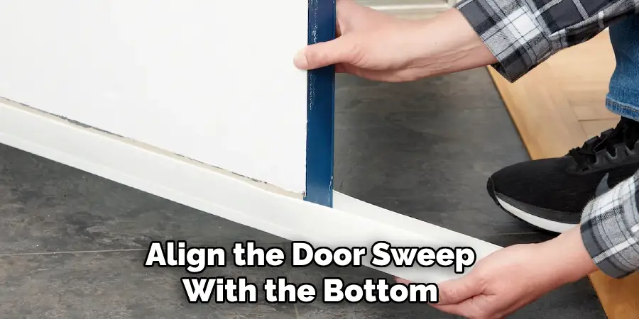 Align the Door Sweep With the Bottom