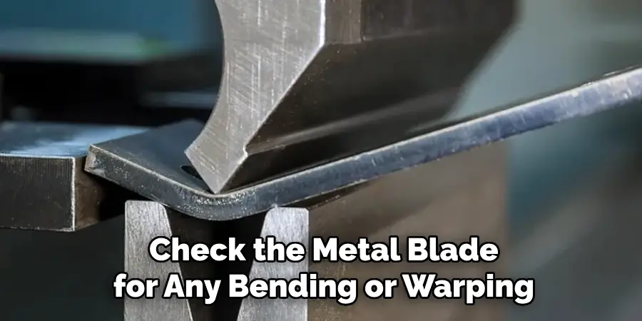 Check the Metal Blade for Any Bending or Warping