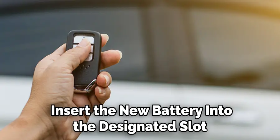 Insert the New Battery Into the Designated Slot