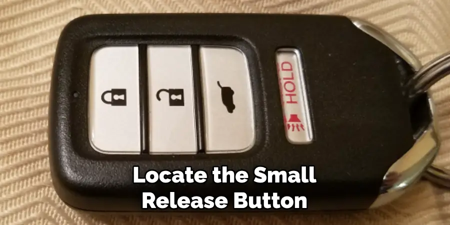 Locate the Small Release Button