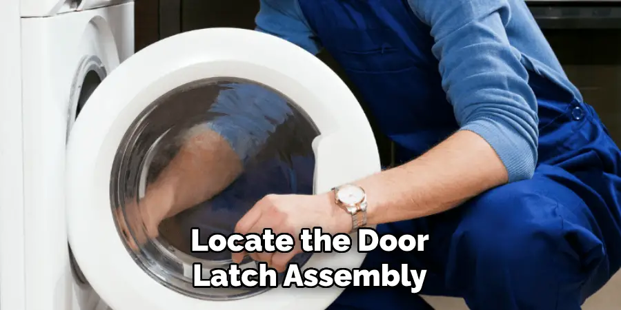 Locate the Door Latch Assembly