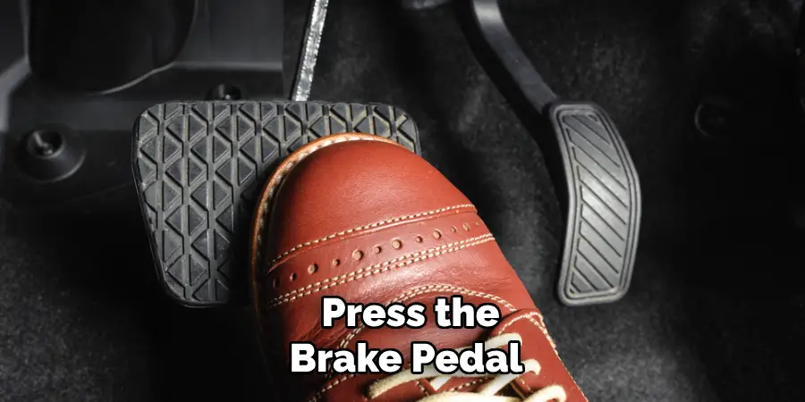 Press the Brake Pedal