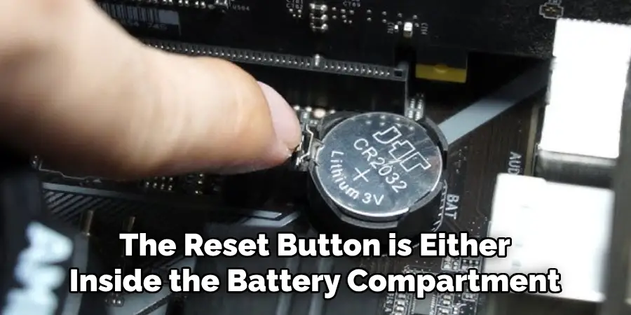 The Reset Button is Either Inside the Battery Compartment